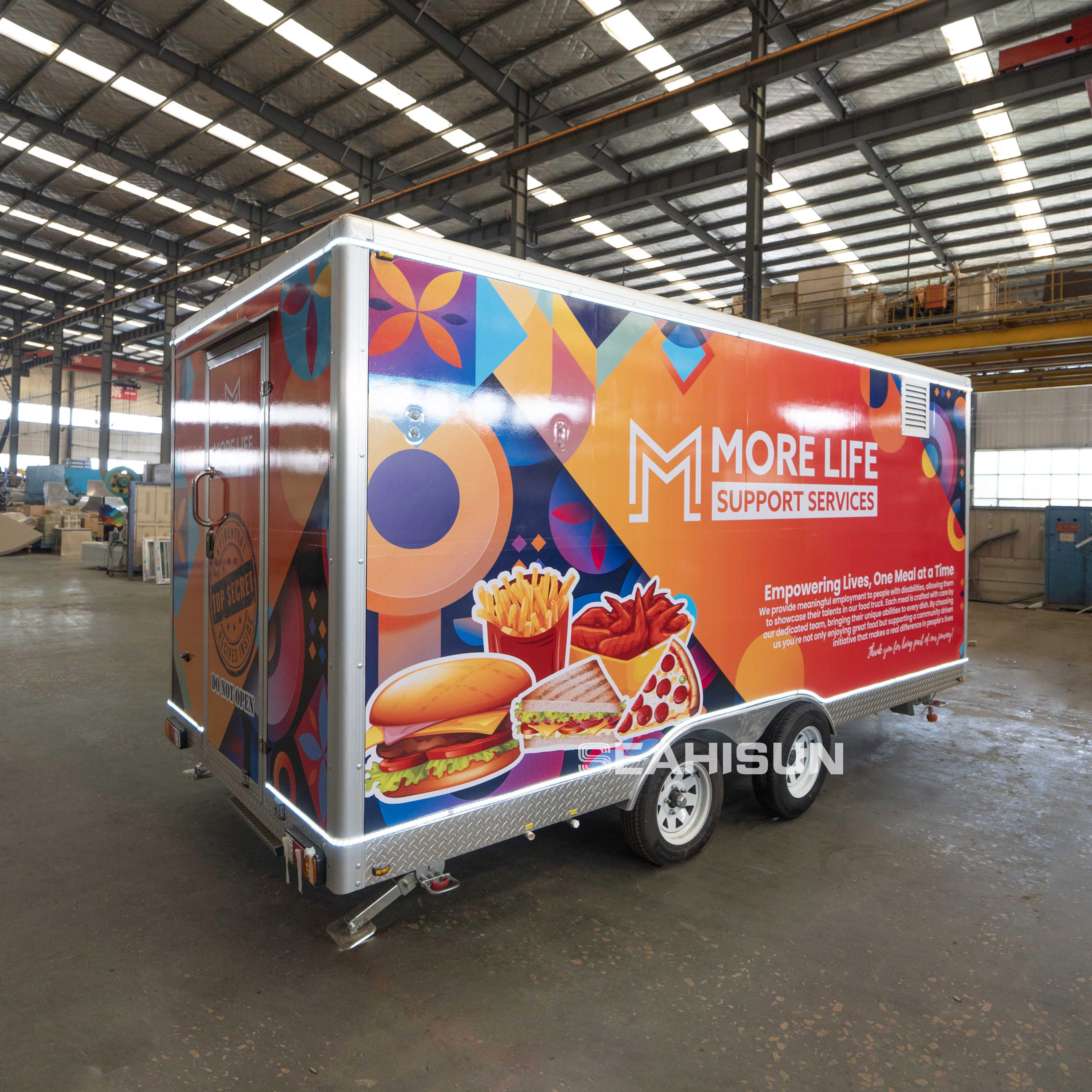 Custom restaurant equipment trailer interior layout with specialized commercial kitchen appliances